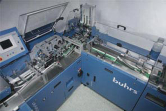 drylin® T Schiene in Kuvertiermaschine
